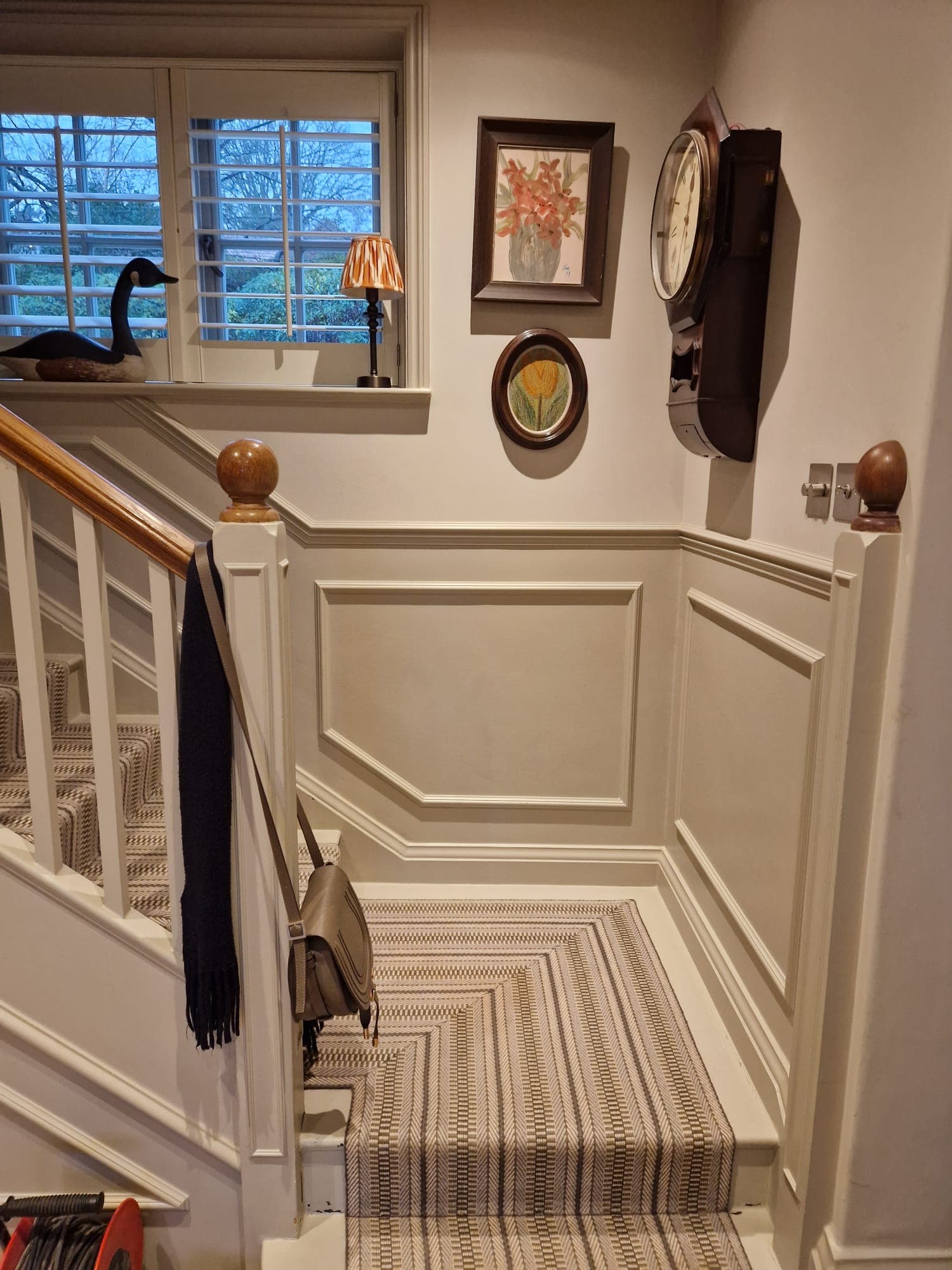 Staircase landing — panelled walls